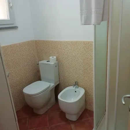 Апартаменты Gina's House With Garden Lunense